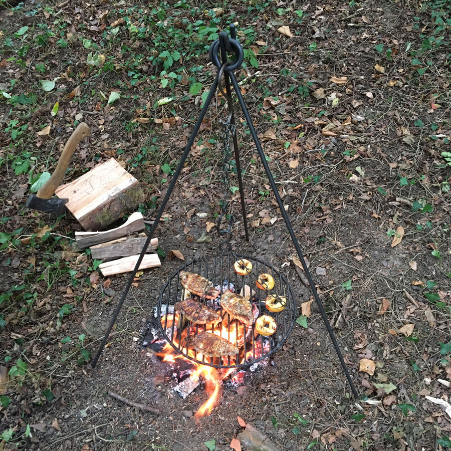 2in1 campfire cooking tripod being used over an open fire. 